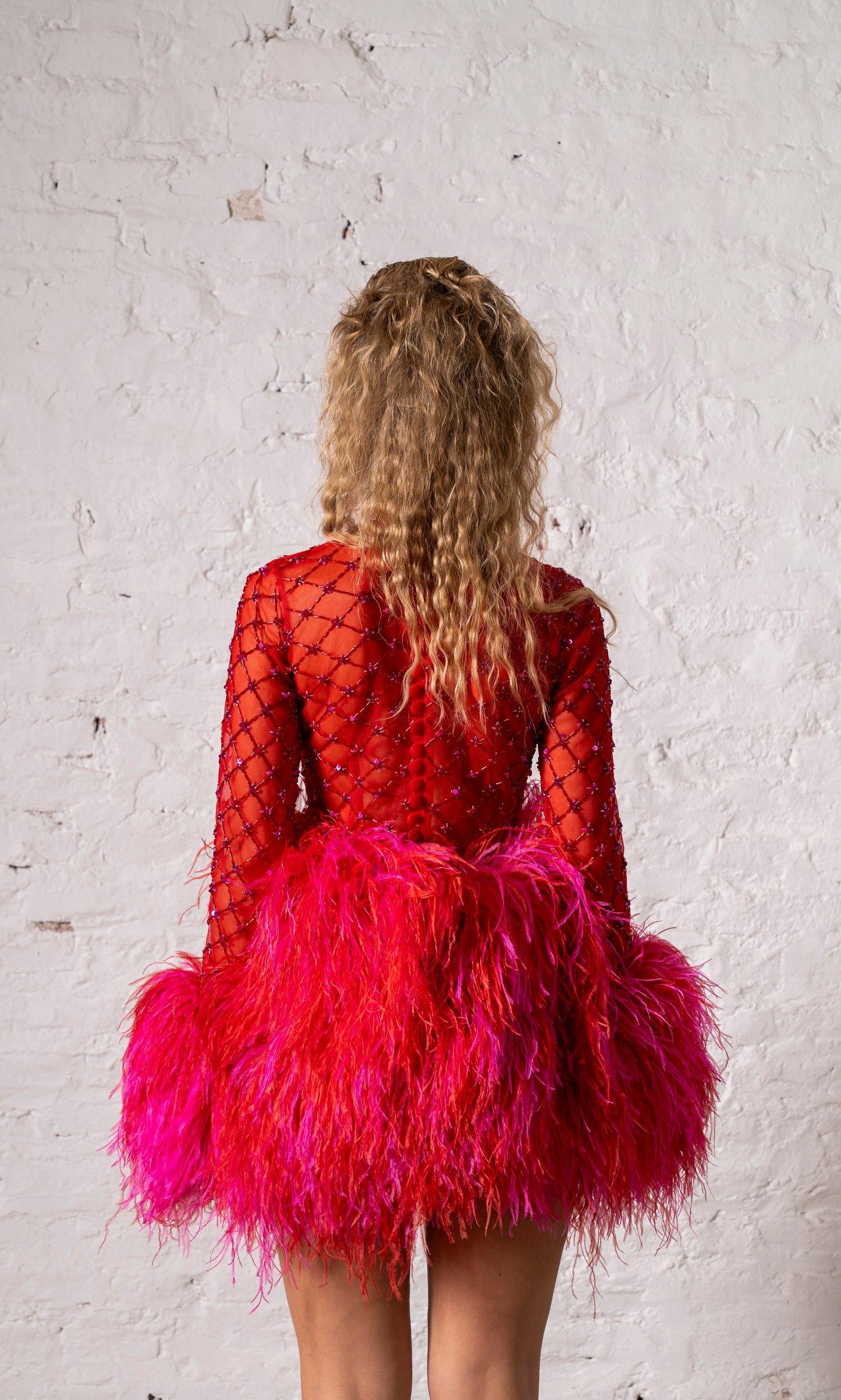 FALDA DE PLUMAS ROJA/MAGENTA